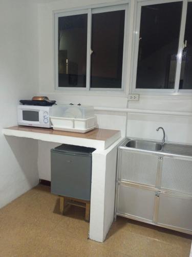Kuchyň nebo kuchyňský kout v ubytování Big Brother Condotel