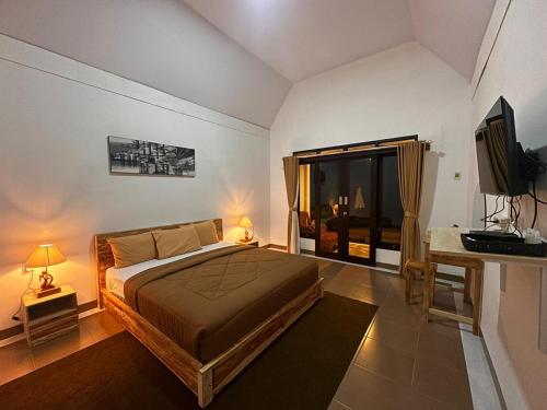 Postel nebo postele na pokoji v ubytování Batur Volcano Basecamp