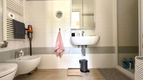a bathroom with a sink and a toilet at S334 - Sirolo, meraviglioso trilocale panoramico in Sirolo