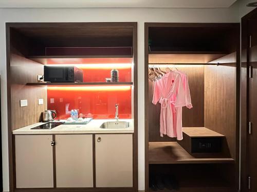 a small kitchen with a sink and a sink at APEC MANDALA Condotel in Phan Thiet