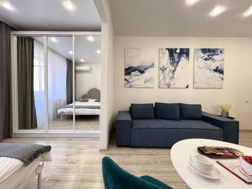 Posezení v ubytování Уютная квартира в новом доме