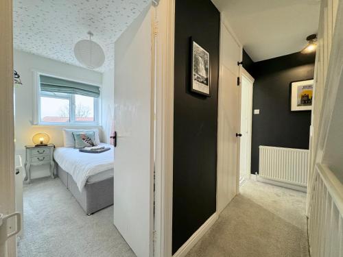 Katil atau katil-katil dalam bilik di Stylish and Cosy stay in the Heart of Malton