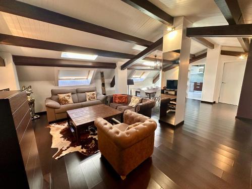 a living room with a couch and a coffee table at Frontera Blanca Premium in Pas de la Casa