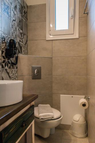 Un baño de Hotel Sunshine Matala