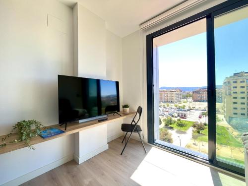 Televisyen dan/atau pusat hiburan di Veracruz Home by Gloove
