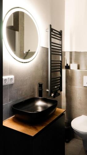 Ένα μπάνιο στο Si-View Einzelzimmer mit Balkon Zimmer 2 - Hotel