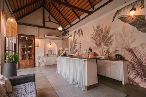 Χώρος καθιστικού στο White Wall Riverfront Hotel