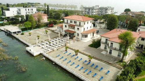 an aerial view of a resort with a marina at Hotel Villa Trieste in Sirmione