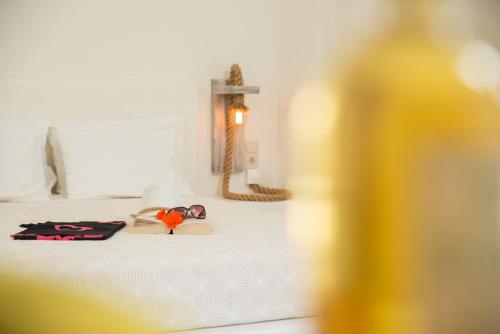 Una cama o camas en una habitación de Hotel Sunshine Matala