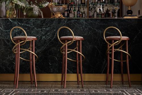 two bar stools in front of a counter at Violino d'Oro Venezia in Venice