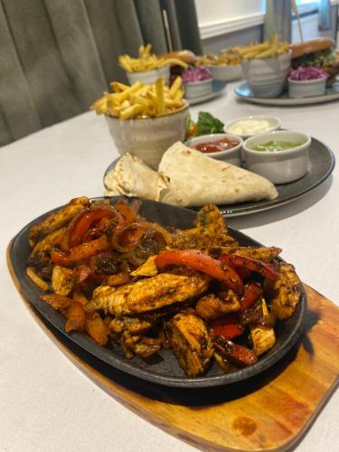 a plate of food on a table with food at Lion Hotel in Worksop