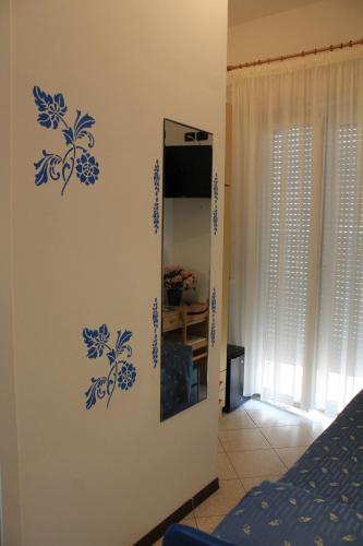 TV a/nebo společenská místnost v ubytování Hotel Piccinelli
