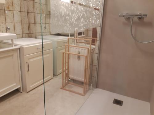 a bathroom with a shower and a glass door at TOP Mountain View in Volders