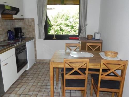 Kuchyň nebo kuchyňský kout v ubytování E15 Freistehendes Haus am Eckwarderhörner Deich