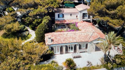 an aerial view of a house with a roof at Cap d’Antibes Sea view villa in Antibes