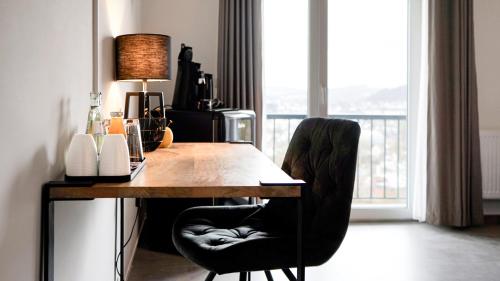 Φωτογραφία από το άλμπουμ του Si-View Doppelzimmer mit Balkon Zimmer 1 - Hotel στο Ζίγκεν