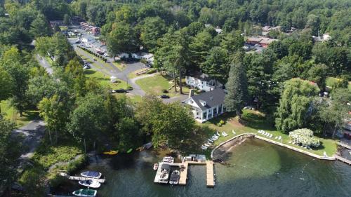 an aerial view of a house on the water at The Villas on Lake George in Diamond Point