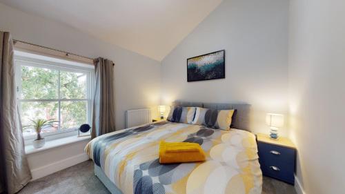 Gulta vai gultas numurā naktsmītnē Modern 1 Bedroom Apartment | WIFI