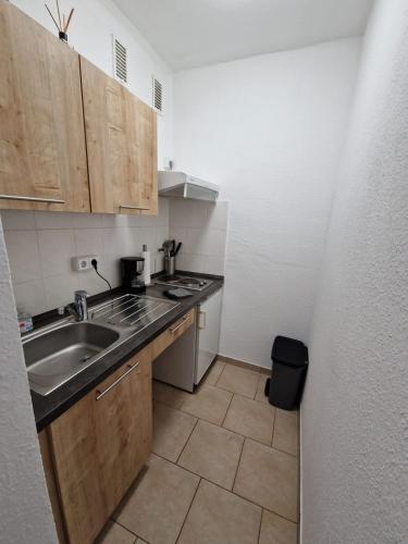 Кухня или кухненски бокс в Zentrale und Komfortable Wohnung