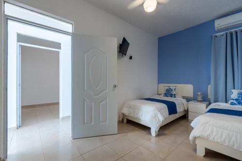 Postel nebo postele na pokoji v ubytování EDMA APARTAHOTEL