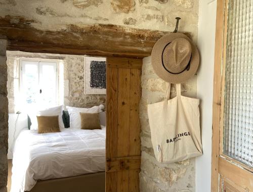 Postel nebo postele na pokoji v ubytování Maison aeterna