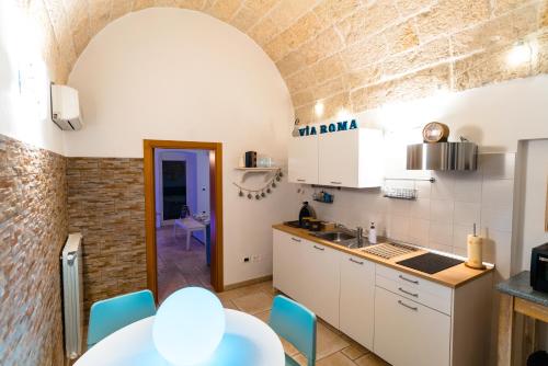 Una cocina o zona de cocina en Le Contrade via Roma