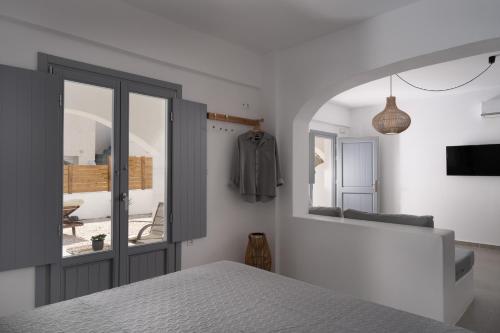 Postel nebo postele na pokoji v ubytování The Vine Suites