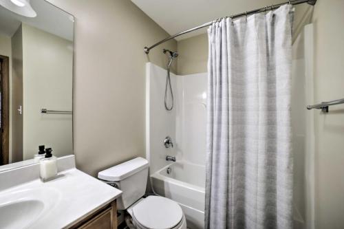 a bathroom with a sink and a toilet and a shower at Family Getaway 16 Mi to Pittsburgh! in Monroeville