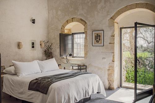 Postel nebo postele na pokoji v ubytování Casa Balat