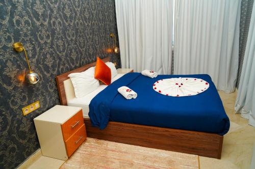 Krevet ili kreveti u jedinici u okviru objekta Great Holiday Apart-Hotel & Penthouse