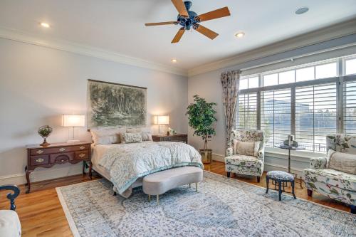 a bedroom with a bed and a ceiling fan at Riverfront North Augusta Home with Private Pool! in North Augusta