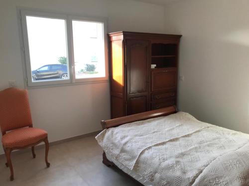 Ένα ή περισσότερα κρεβάτια σε δωμάτιο στο Appartement à Ghisonaccia-Prunelli