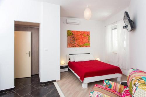 Apartment Banjska tesisinde bir odada yatak veya yataklar