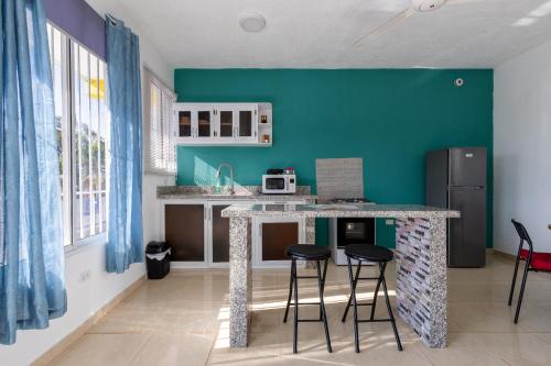 Kuchyň nebo kuchyňský kout v ubytování EDMA APARTAHOTEL