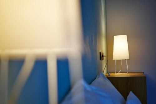 Apartmán Krásná Lípa č. 1にあるベッド