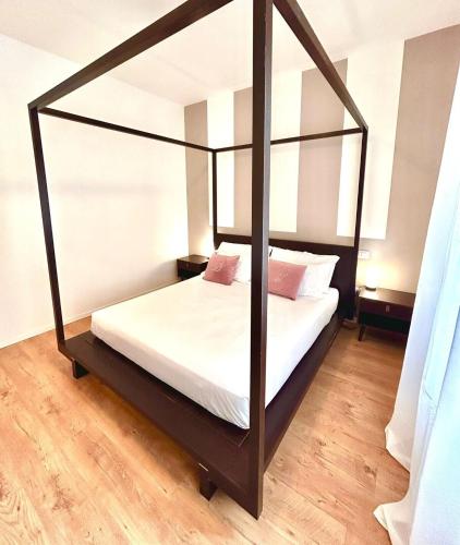 Postel nebo postele na pokoji v ubytování Fiera Maison