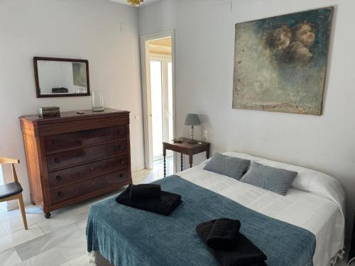 Кровать или кровати в номере Wonderful duplex in Calle Betis