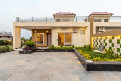 a rendering of a house with a courtyard at ELIVAAS 2 BHK Pet Friendly Villa with Pvt Pool - Heaven in Hill in Udaipur