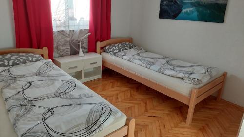 Postel nebo postele na pokoji v ubytování Andrić