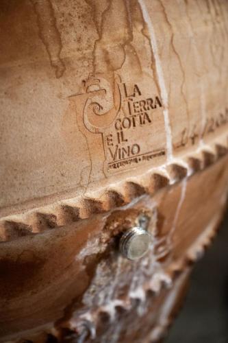 a close up of a close up of a wooden shoe at Eclipse Winery Boutique Hotel in Kvareli