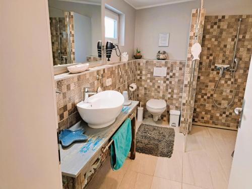 Ένα μπάνιο στο Haus am Meer Strandgeflüster