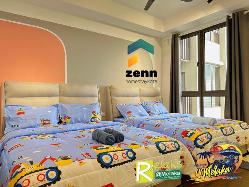 a bedroom with two beds with toys on them at The Bali Residences Premium Suites Melaka in Melaka