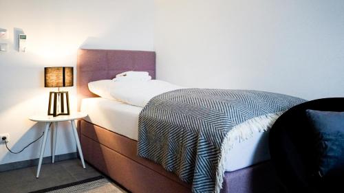 Krevet ili kreveti u jedinici u okviru objekta SI-View Einzelzimmer Zimmer 24