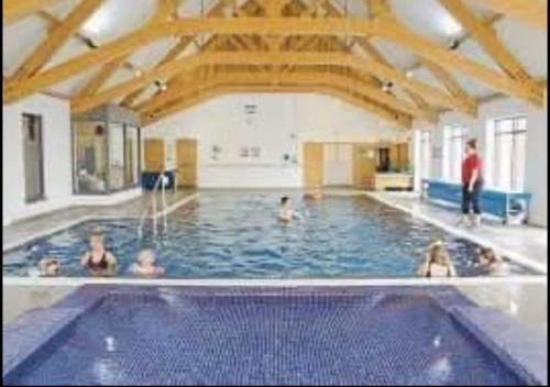 a group of people in a swimming pool at Caravan in morecombe in Morecambe