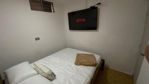 Posteľ alebo postele v izbe v ubytovaní REST APARTMENT IN THE POBLADO