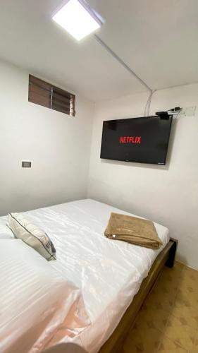 Katil atau katil-katil dalam bilik di REST APARTMENT IN THE POBLADO