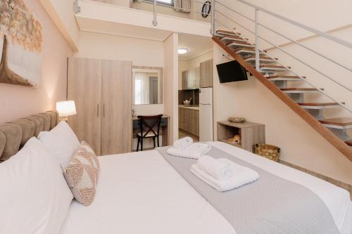 Postel nebo postele na pokoji v ubytování Arz Apartments