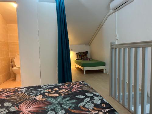 Postel nebo postele na pokoji v ubytování GITE PEI LA VANILLE Duplex Bord de Nature
