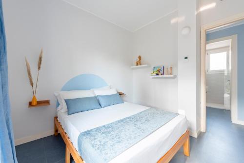 Postel nebo postele na pokoji v ubytování Villa Macera con Palestra e Golf Resté Italy