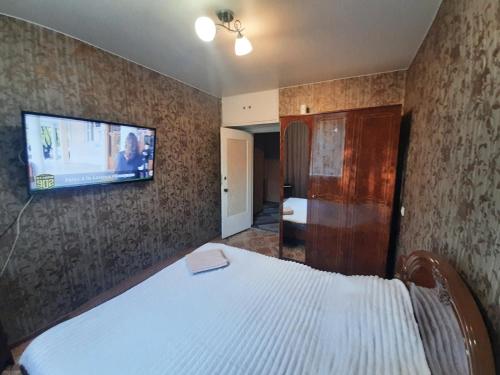 Llit o llits en una habitació de Apartament sectorul centru